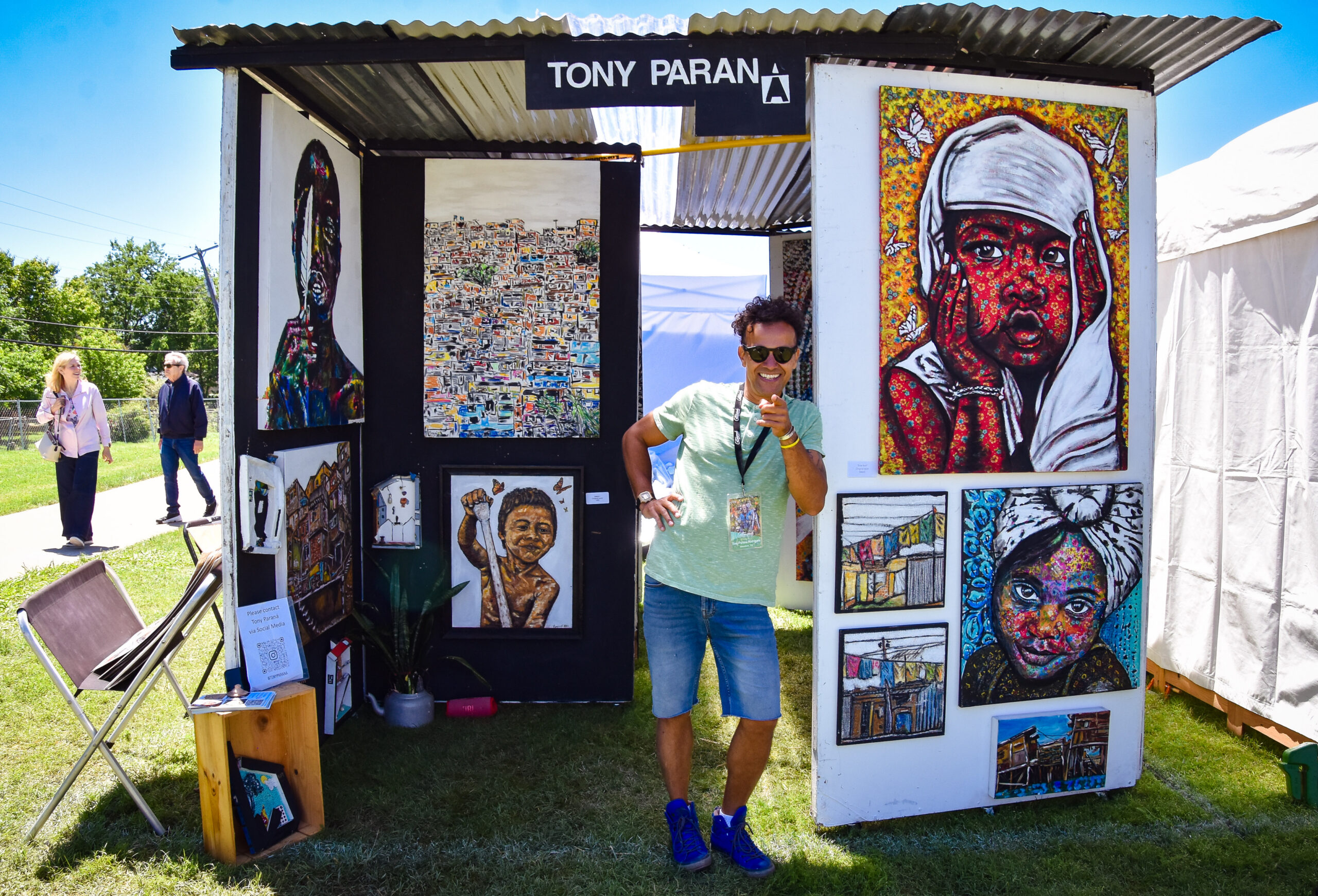 Tony Parnana with an art buyer